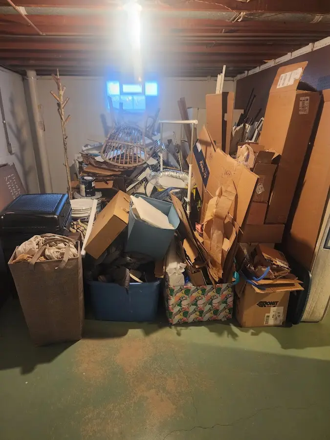 Roll-off dumpster container at job site for Construction Dumpster Rental in Pittsboro